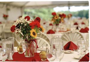 Fall flowers, freshly picked from an area farm, and nontoxic beeswax candles provide a festive setting for dining on local foods and relaxed conversation.
